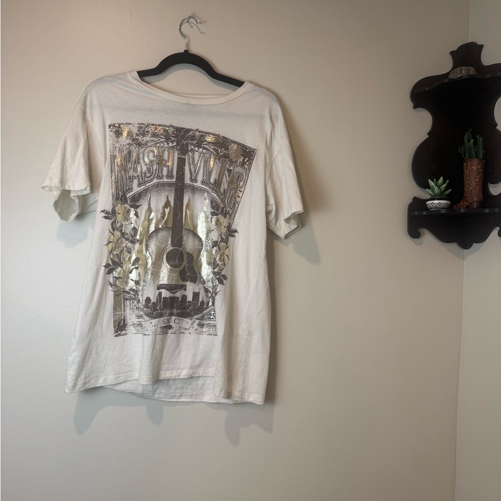 White Graphic T-Shirt with Gold and Black Design